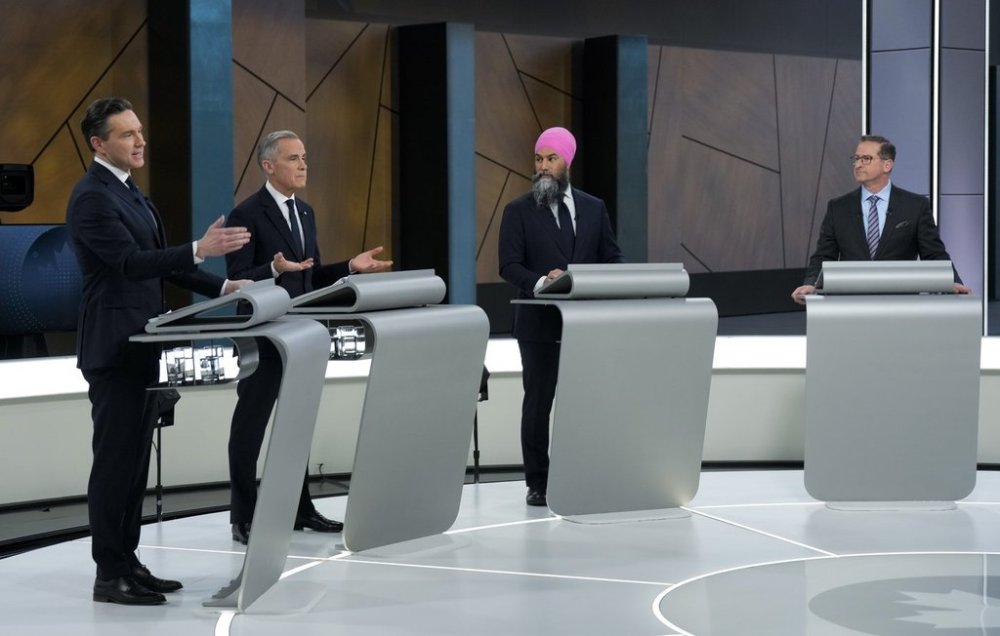 Conservative Leader Pierre Poilievre, left to right, Liberal Leader Mark Carney, New Democratic Party Leader Jagmeet Singh and Bloc Quebecois Leader Yves-Francois Blanchet participate in the English-language federal leaders' debate in Montreal on April 17, 2025. THE CANADIAN PRESS/Adrian Wyld