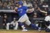 Toronto Blue Jays' Alejandro Kirk hits a two-run double during the ninth inning of a baseball game against the New York Yankees Friday, April 25, 2025, in New York. (AP Photo/Frank Franklin II)