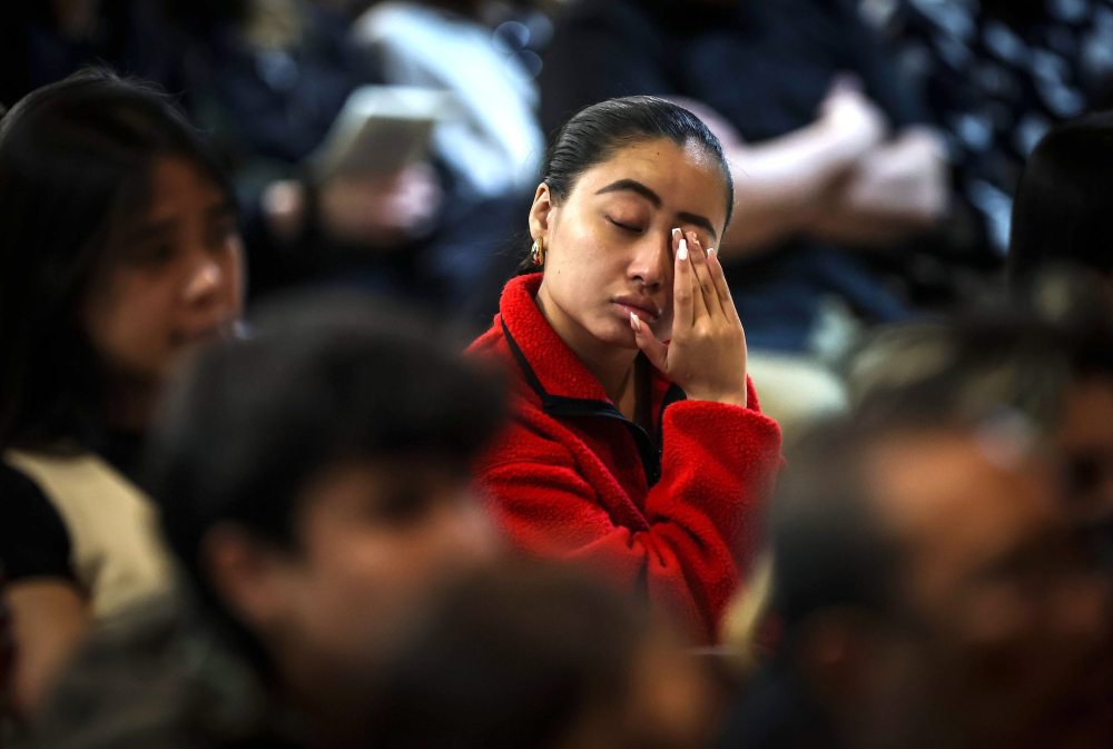 JOHN WOODS / FREE PRESS
The local Filipino community wanted to gather to share their sorrow.
