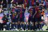 Barcelona players celebrate after a goal during the La Liga soccer match between Barcelona and Real Madrid in Barcelona, Spain, Sunday, May 11, 2025. AP Photo/Joan Monfort)