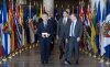 Prime Minister Mark Carney, front left, walks alongside Quebec Premier Francois Legault as first ministers arrive for a meeting at the National War Museum in Ottawa on Friday, March 21, 2025. THE CANADIAN PRESS/Adrian Wyld
