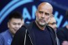 Manchester City's head coach Pep Guardiola waits for the start of the English Premier League soccer match between Manchester City and Bournemouth at the Etihad stadium in Manchester, England, Tuesday, May 20, 2025. (AP Photo/Dave Thompson)