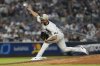 New York Yankees pitcher Jonathan Loáisiga throws during the sixth inning of a baseball game against the New York Mets Friday, May 16, 2025, in New York. (AP Photo/Seth Wenig)