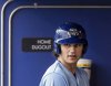 FILE - The Omaha Storm Chasers' Jac Caglianone waits in the dugout before his at-bat in a minor league baseball game against St. Paul at Werner Park in Papillion, Neb. on May 27, 2025. (Chris Machian/Omaha World-Herald via AP, file)