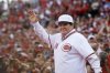 FILE - In this June 24, 2016, file photo, former Cincinnati Red Pete Rose waves to the crowd as he is introduced on the field during a ceremony to honor the 1976 World Series champions team, before the Reds' baseball game against the San Diego Padres in Cincinnati.  (AP Photo/John Minchillo, File)