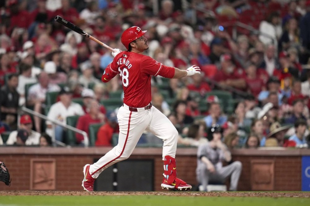 St. Louis Cardinals' Nolan Arenado follows through on a three-run triple during the sixth inning of a baseball game against the Arizona Diamondbacks Friday, May 23, 2025, in St. Louis. (AP Photo/Jeff Roberson)