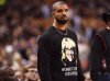 Rapper Drake watches second half NBA basketball action between the Golden State Warriors and Toronto Raptors in Toronto on Wednesday, November 16, 2016. THE CANADIAN PRESS/Frank Gunn