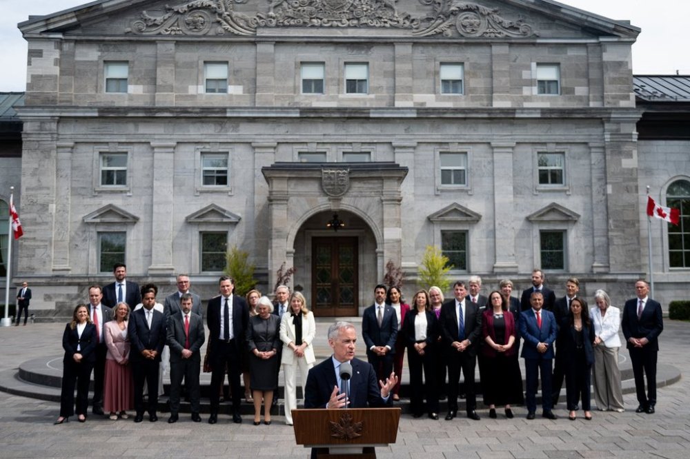 Prime Minister Mark Carney speaks to reporters following a swearing-in ceremony at Rideau Hall in Ottawa, on Tuesday, May 13, 2025. THE CANADIAN PRESS/Spencer Colby