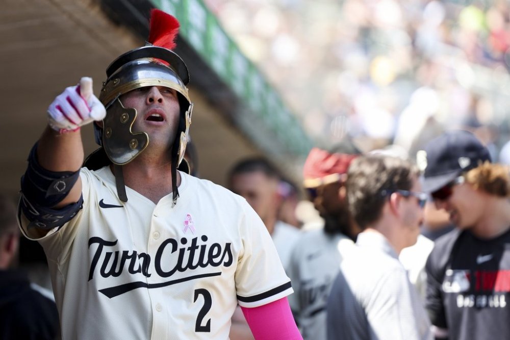 Minnesota Twins' Brooks Lee celebrates after hitting a home run during the fourth inning of a baseball game against the San Francisco Giants, Sunday, May 11, 2025, in Minneapolis. (AP Photo/Ellen Schmidt)