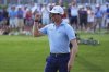 Ben Griffin reacts after finishing the 18th hole to win the Charles Schwab Challenge golf tournament at Colonial Country Club in Fort Worth, Texas, Sunday, May 25, 2025. (AP Photo/LM Otero)