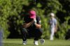 Jon Rahm, of Spain, reacts to his tee shot on the 14th hole during the final round of the PGA Championship golf tournament at the Quail Hollow Club, Sunday, May 18, 2025, in Charlotte, N.C. (AP Photo/George Walker IV)