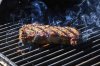 This July 2022, image provided by Cheyenne Cohen shows a ribeye steak on a grill in New Milford, Conn. (Cheyenne Cohen via AP)