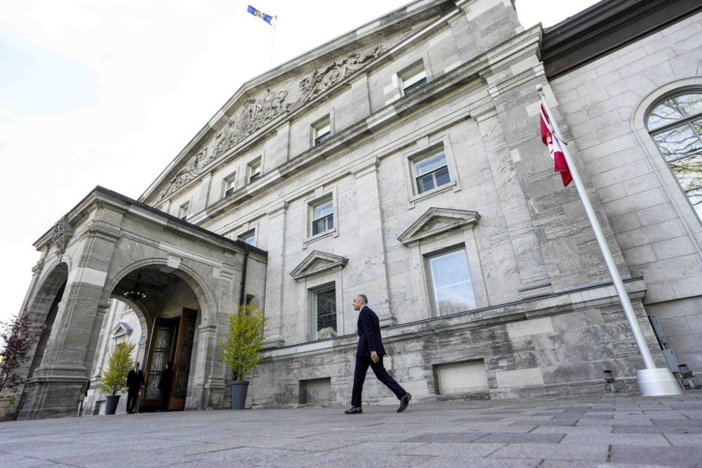 Prime Minister Mark Carney arrives for the cabinet swearing-in ceremony at Rideau Hall in Ottawa on Tuesday, May 13, 2025. THE CANADIAN PRESS/Spencer Colby