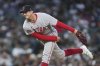 Boston Red Sox pitcher Garrett Whitlock throws against the Detroit Tigers in the sixth inning during a baseball game, Tuesday, May 13, 2025, in Detroit. (AP Photo/Paul Sancya)