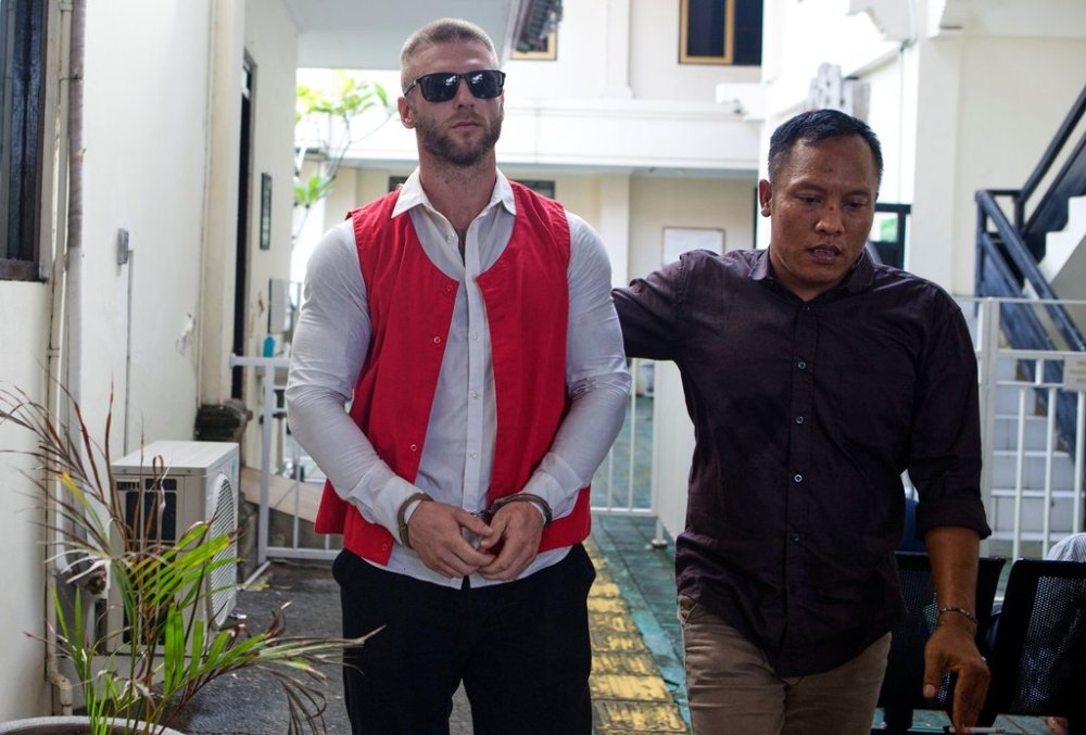 British citizen Thomas Parker walks towards a district court before he is sentenced for drug offenses, in Denpasar in Bali, Indonesia, Tuesday, May 27, 2025. (AP Photo/Firdia Lisnawati)