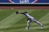 Miami Marlins center fielder Derek Hill makes a catch on a ball hit by Los Angeles Angels' Nolan Schanuel during the eighth inning of a baseball game Sunday, May 25, 2025, in Anaheim, Calif. (AP Photo/Mark J. Terrill)
