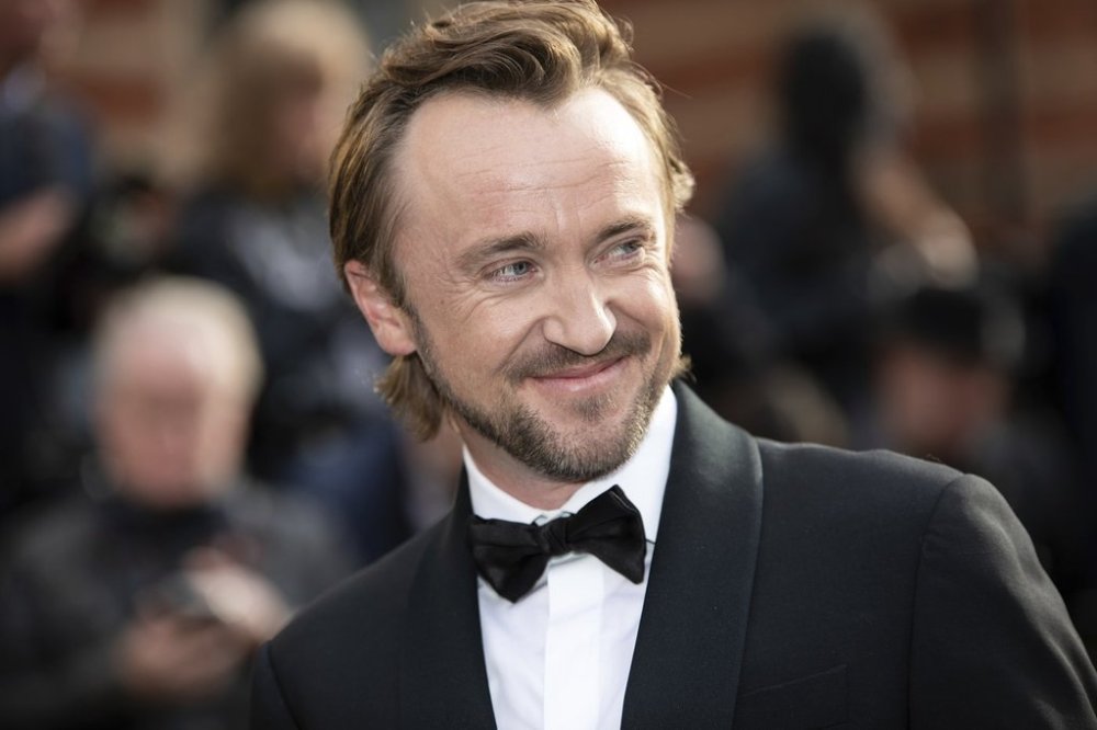 FILE - Tom Felton poses for photographers upon arrival at the Olivier Awards in London, Sunday, April 10, 2022. (Photo by Vianney Le Caer/Invision/AP, File)