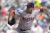 FILE - Boston Red Sox pitcher Rich Hill throws against the Detroit Tigers in the fifth inning of a baseball game, Sept. 1, 2024, in Detroit. (AP Photo/Paul Sancya, File)