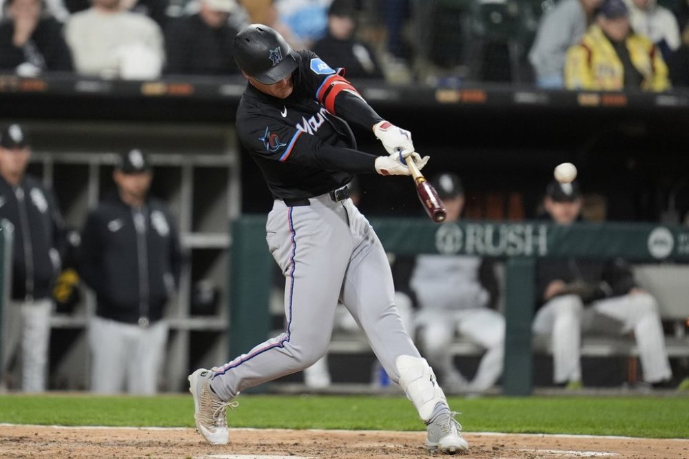Miami Marlins' Eric Wagaman hits a two-run triple during the eighth inning of a baseball game against the Chicago White Sox, Saturday, May 10, 2025, in Chicago. (AP Photo/Erin Hooley)