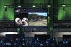 FILE - Rory McIlroy of Boston Common Golf watches a digital projection of his shot on the 13th hole during a match of the TMRW Golf League (TGL) against Jupiter Links Golf Club, Monday, Jan. 27, 2025, in Palm Beach Gardens, Fla. (AP Photo/Rebecca Blackwell, File)