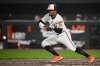 FILE - Baltimore Orioles' Tony Kemp bunts during a baseball game against the Kansas City Royals, Tuesday, April 2, 2024, in Baltimore. (AP Photo/Nick Wass, File)