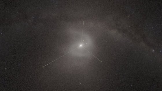 This image provided by the American Museum of Natural History shows a new planetarium show showing a backwards S-shaped spiral in what's known as the Oort Cloud far beyond Pluto. (American Museum of Natural History via The Associated Press)