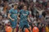 Bournemouth's Dean Huijsen, left, and Bournemouth's Illya Zabarnyi celebrate at the end of the English Premier League soccer match between Arsenal and Bournemouth at Emirates stadium in London, Saturday, May 3, 2025. (AP Photo/Kin Cheung)