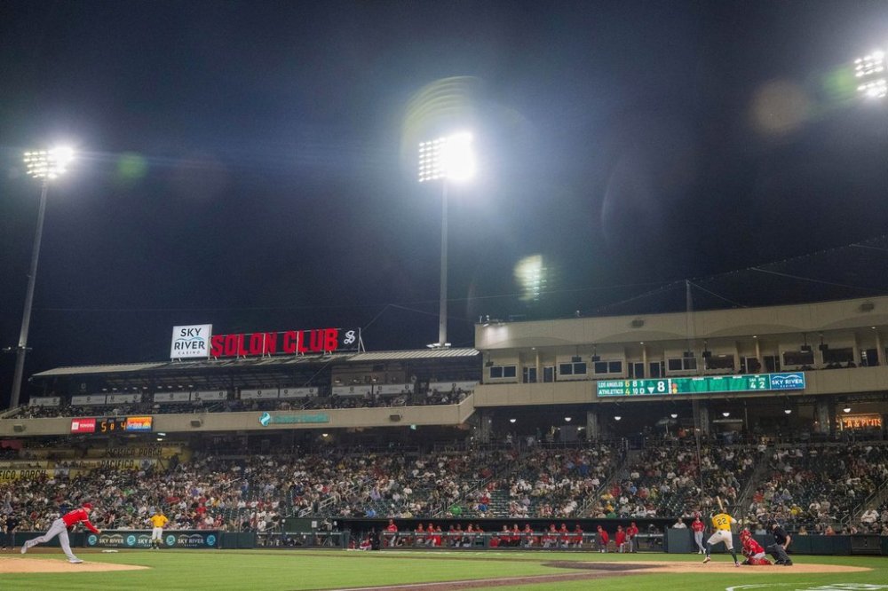 Los Angeles Angels pitcher Hunter Strickland throws against Athletics Miguel Andujar during the eighth inning of a baseball game in West Sacramento, Calif., Tuesday, May 20, 2025. (AP Photo/Nic Coury)