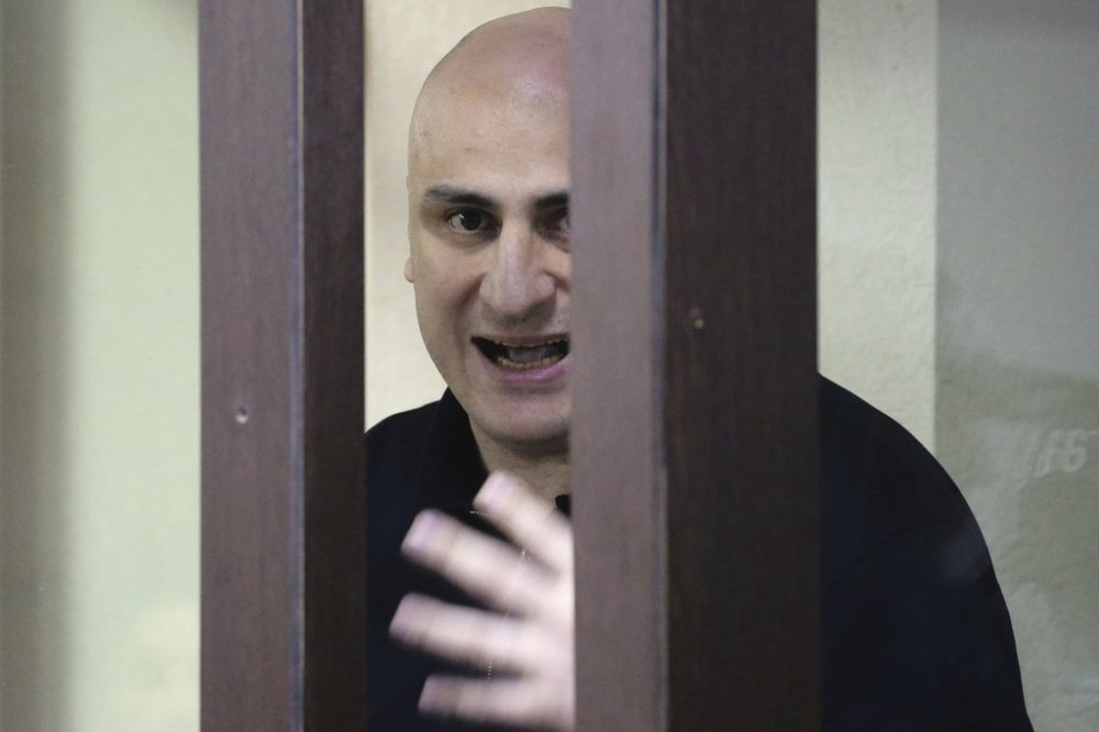 Nika Melia, one of the leaders of the Coalition for Change opposition group, charged with failing to appear before the Georgian parliament's temporary investigative commission, attends a court hearing in Tbilisi, Georgia on Friday, May 30, 2025. (Irakli Gedenidze/Pool Photo via AP)