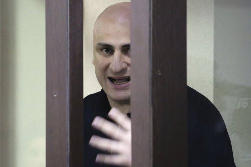Nika Melia, one of the leaders of the Coalition for Change opposition group, charged with failing to appear before the Georgian parliament's temporary investigative commission, attends a court hearing in Tbilisi, Georgia on Friday, May 30, 2025. (Irakli Gedenidze/Pool Photo via AP)