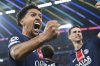 PSG's Marquinhos celebrates during the Champions League final soccer match between Paris Saint Germain and Inter Milan, at the Allianz Arena in Munich, Germany, Saturday, May 31, 2025. (Sven Hoppe/dpa via AP)