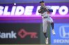 Los Angeles Dodgers shortstop Mookie Betts throws to first base to put out Cleveland Guardians' Gabriel Arias during the fifth inning of a baseball game, Monday, May 26, 2025, in Cleveland. (AP Photo/David Dermer)