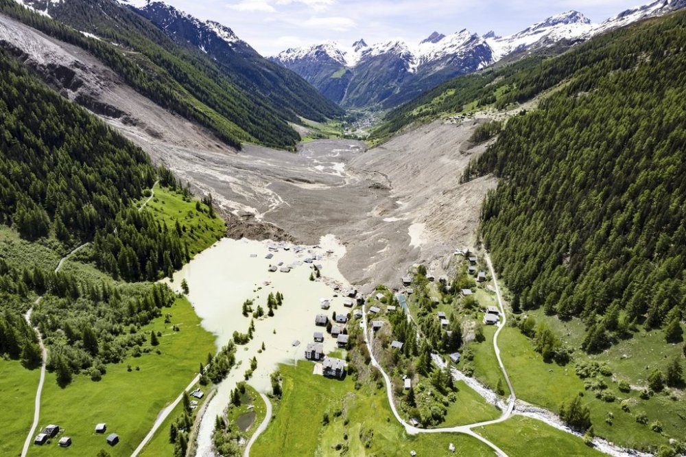 An aerial view shows the destruction of Blatten, Switzerland, Thursday, May 29, 2025, one day after a massive debris avalanche, triggered by the collapse of the Birch Glacier, swept down to the valley floor and demolished large parts of the village. (Jean-Christophe Bott/Keystone via AP)