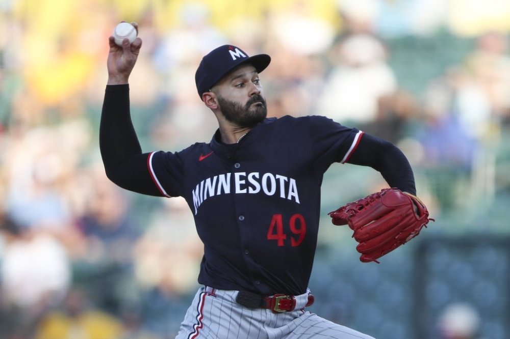 Minnesota Twins pitcher Pablo López throws a pitch to an Athletics batter during the first inning of a baseball game Tuesday, June 3, 2025, in West Sacramento, Calif. (AP Photo/Scott Marshall)