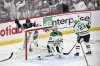 Winnipeg Jets' Mark Scheifele (55) celebrates a goal by Nikolaj Ehlers on Dallas Stars' goaltender Jake Oettinger (29) during first-period NHL playoff action in Winnipeg, Friday, May 9, 2025. THE CANADIAN PRESS/Fred Greenslade