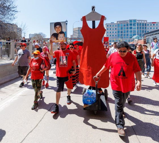 Hundreds of people walked from Memorial Park to The Forks during the annual Red Dress Day memorial walk, Monday morning. (Mike Deal / Free Press files)