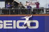 New York Mets outfielder Brandon Nimmo (9) catches a ball hit by Pittsburgh Pirates' Joey Bart during the eighth inning of a baseball game Monday, May 12, 2025, in New York. (AP Photo/Pamela Smith)