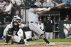 Detroit Tigers's Kerry Carpenter hits a solo home run during the sixth inning of a baseball game against the Chicago White Sox in Chicago, Monday, June 2, 2025. (AP Photo/Nam Y. Huh)