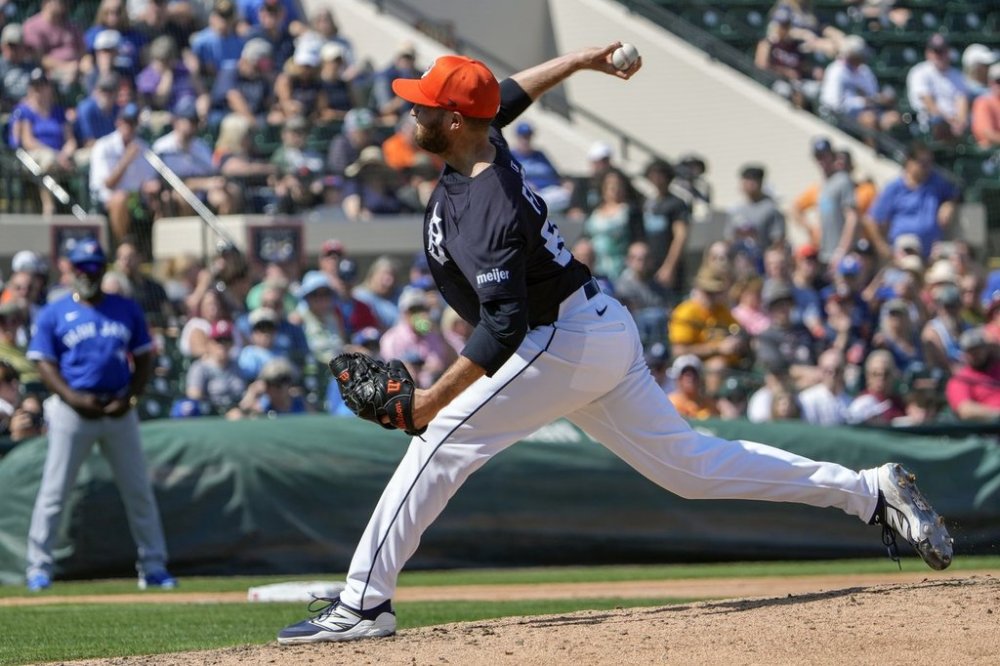 FILE - Detroit Tigers pitcher Jason Foley throws against the Toronto Blue Jays in the fourth inning of a spring training baseball game, March 3, 2025, in Lakeland, Fla. (AP Photo/John Raoux, File)