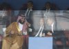 FILE - Saudi Arabia Crown Prince Mohammed bin Salman, left, FIFA President Gianni Infantino, center, and Russian President Vladimir Putin watch the match between Russia and Saudi Arabia which opens the 2018 soccer World Cup at the Luzhniki stadium in Moscow, Russia, on June 14, 2018. (AP Photo/Hassan Ammar, File)