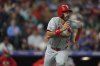 FILE - St. Louis Cardinals designated hitter Matt Carpenter (13) runs in the seventh inning of a baseball game, Sept. 24, 2024, in Denver. (AP Photo/David Zalubowski, file)