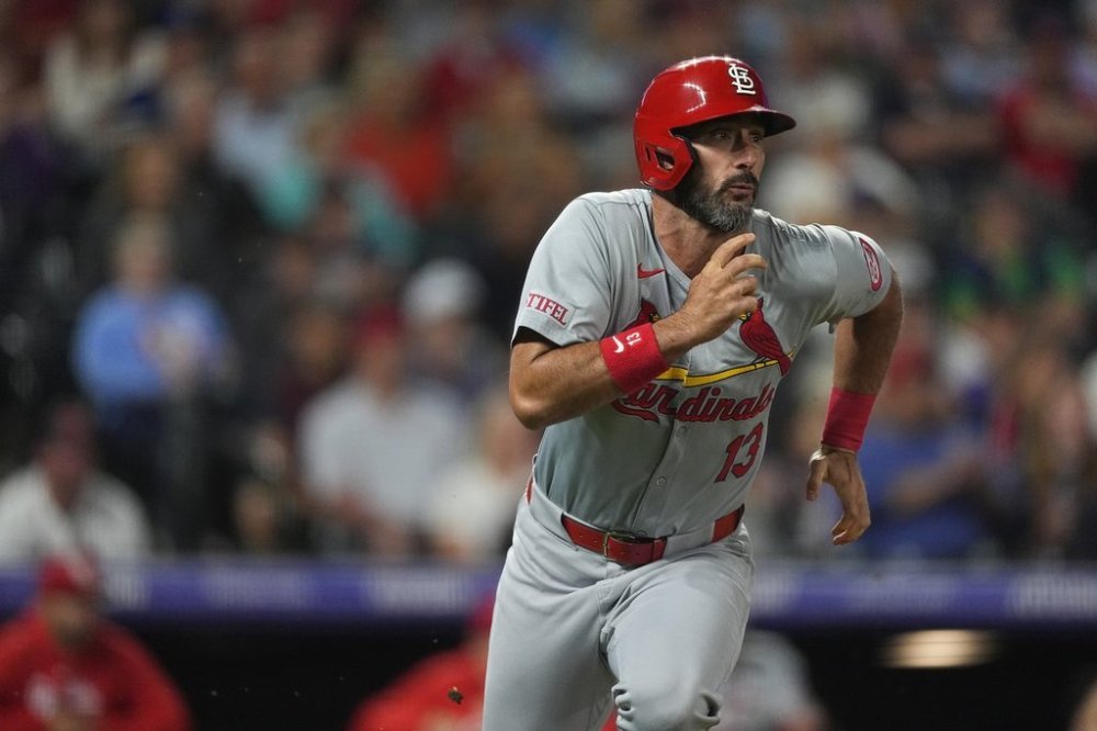 FILE - St. Louis Cardinals designated hitter Matt Carpenter (13) runs in the seventh inning of a baseball game, Sept. 24, 2024, in Denver. (AP Photo/David Zalubowski, file)