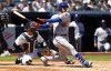 New York Mets' Juan Soto (22) hits a a single against the New York Yankees during the fourth inning of a baseball game, Saturday, May 17, 2025, in New York. (AP Photo/Noah K. Murray)