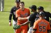 Baltimore Orioles' Coby Mayo, front left, pushes Chicago White Sox second baseman Lenyn Sosa (50) after he was tagged out in a rundown during the fourth inning of a baseball game, Saturday, May 31, 2025, in Baltimore. (AP Photo/Nick Wass)