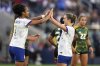 United States' Ally Sentnor, right, is congratulated by teammate Lily Yohannes after scoring during the first half of an international friendly soccer match against Jamaica Tuesday, June 3, 2025, in St. Louis. (AP Photo/Jeff Roberson)