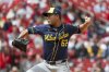 Milwaukee Brewers starting pitcher Bryan Hudson throws during the fifth inning of a baseball game against the St. Louis Cardinals, Sunday, April 27, 2025, in St. Louis. (AP Photo/Scott Kane)