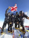 Four British climbers pose on the summit of Mount Everest less than a week after leaving London, in one of the fastest ascents on record of the world's highest peak, in Nepal, Wednesday, May 21, 2025. (Sandro Gromen via AP)