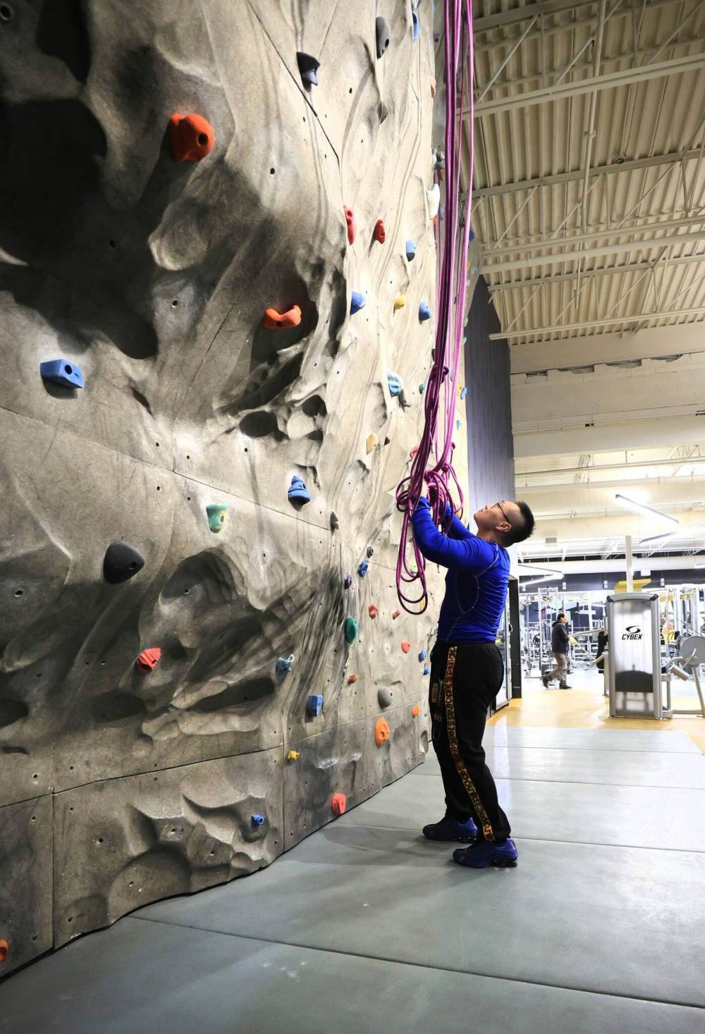 RUTH BONNEVILLE / FREE PRESS
An instructor checking out the ropes at their new climbing wall.