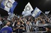 FILE - San Diego FC fans sing before the team hosts St. Louis City in an MLS soccer match Saturday, March 1, 2025, in San Diego. (AP Photo/Gregory Bull, File)
