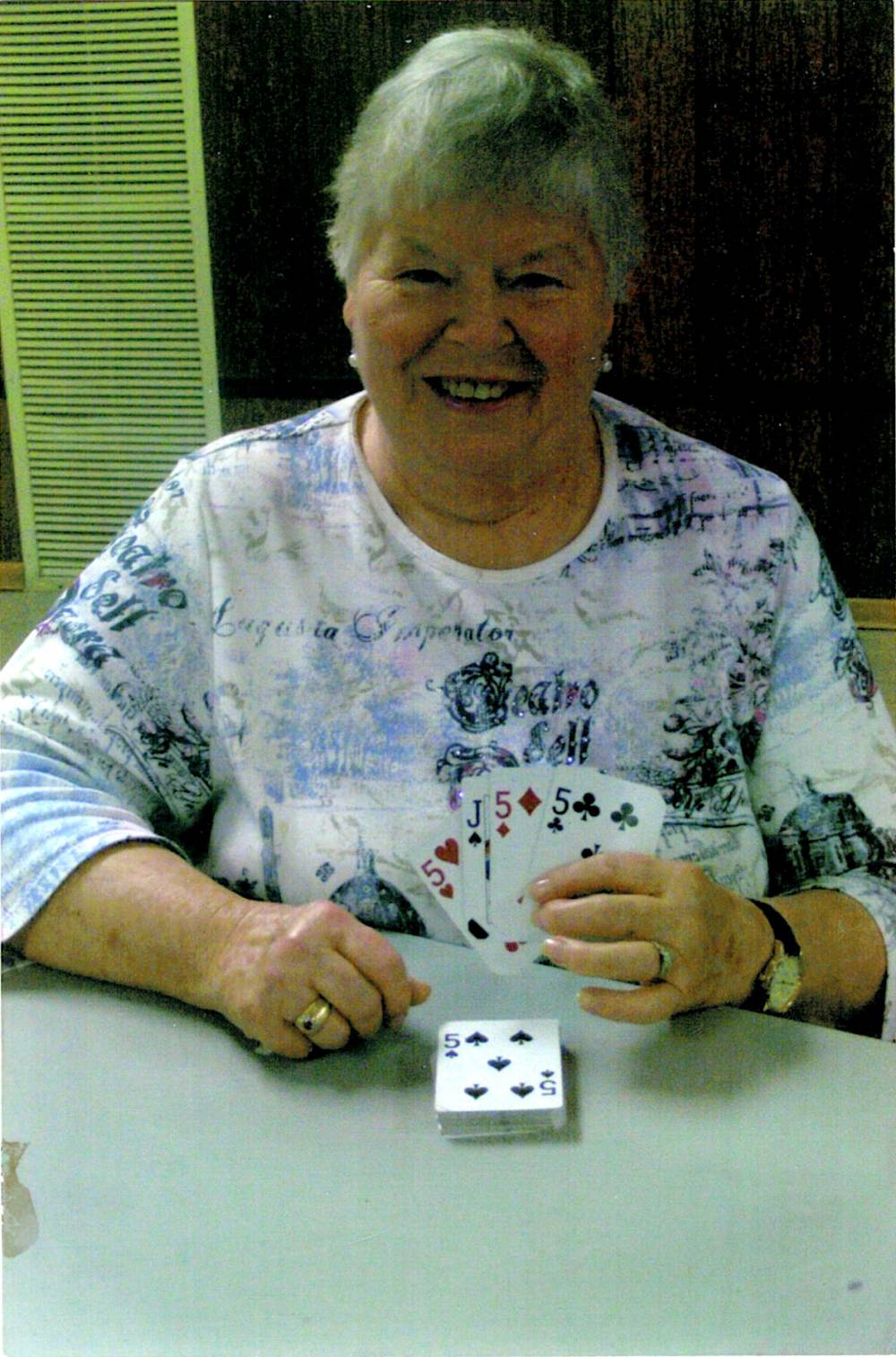 Betty Robertson playing cards. Photo courtesy of Robertson Family Estate.